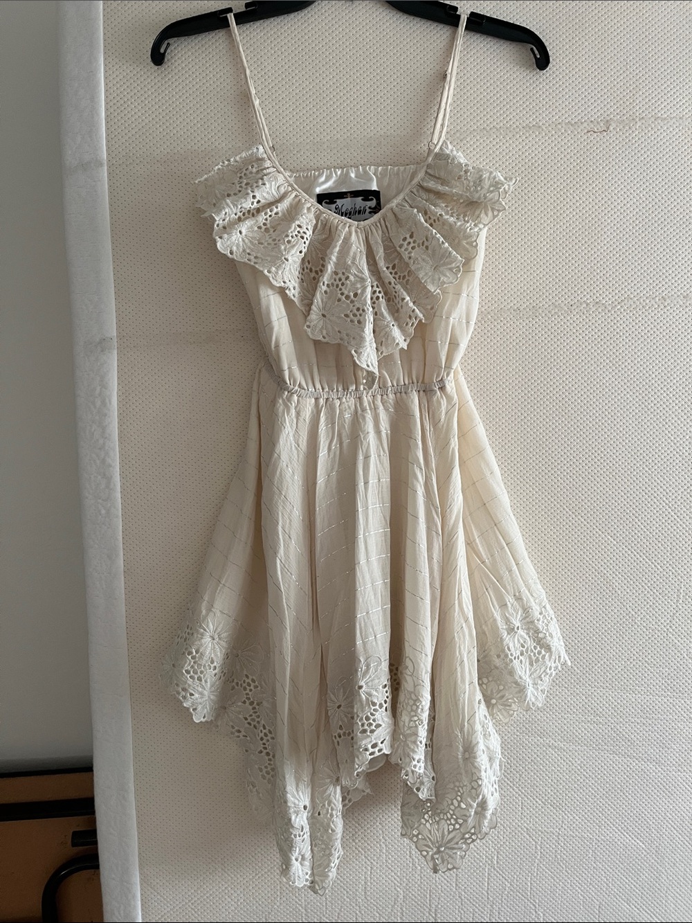 Meghan LA Cream Lace Ruffle Handkerchief Hem Mini Dress